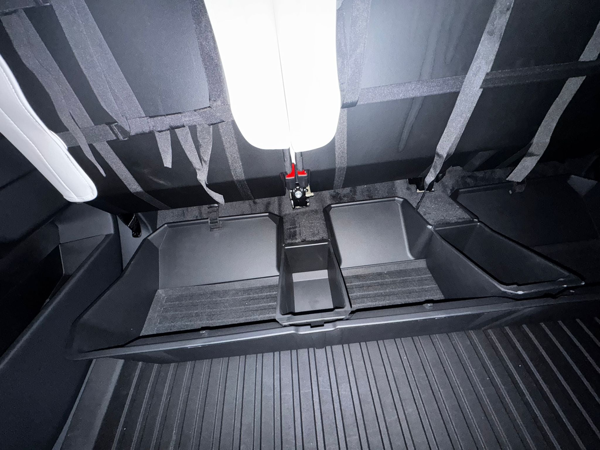 Tesstudio modular under-seat storage for Cybertruck's second row organizes accessories efficiently